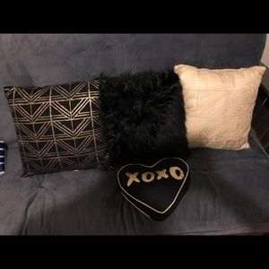 Black and gold decor pillows